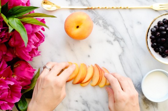 Slicing peaches for sangria